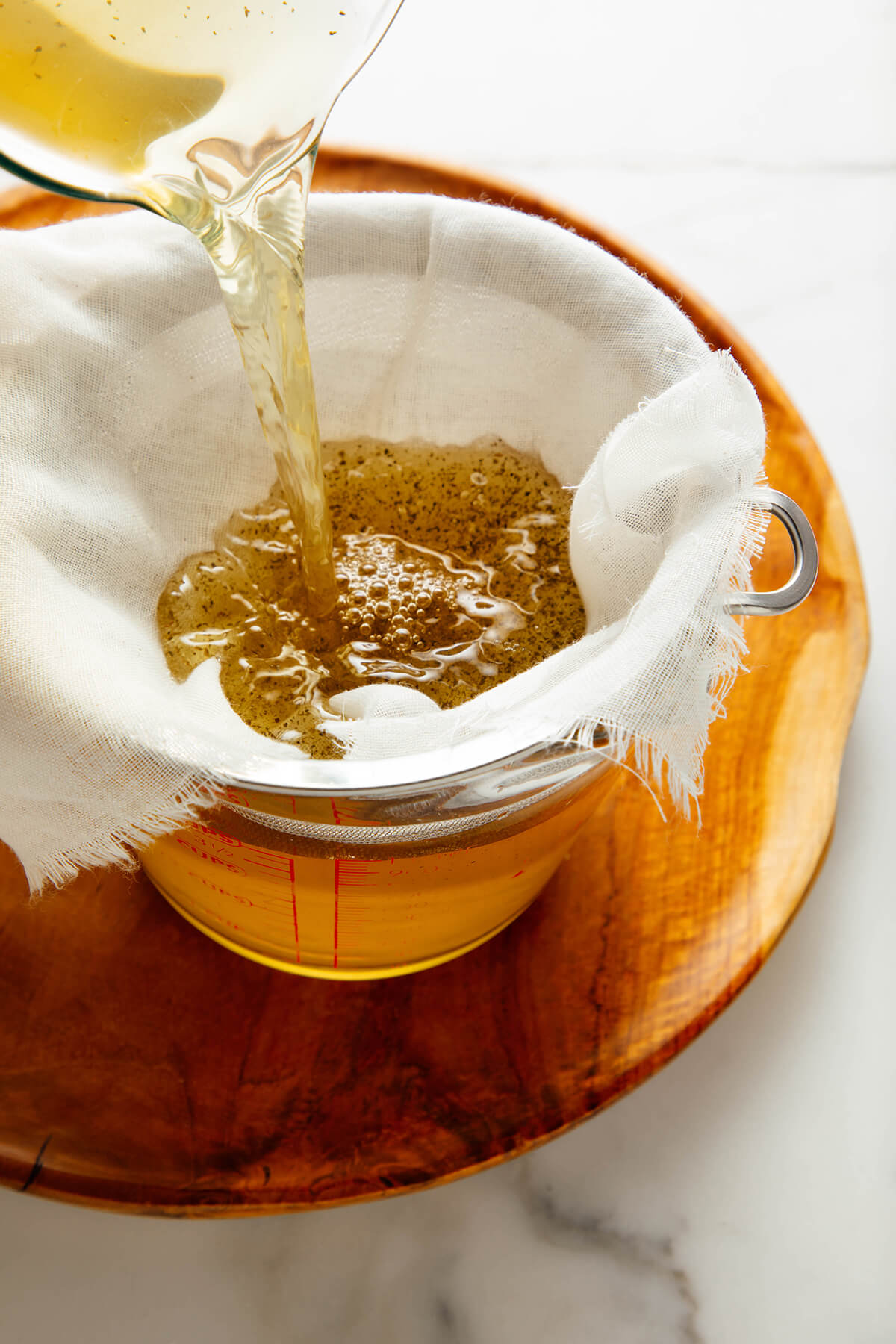 straining cold brew iced tea
