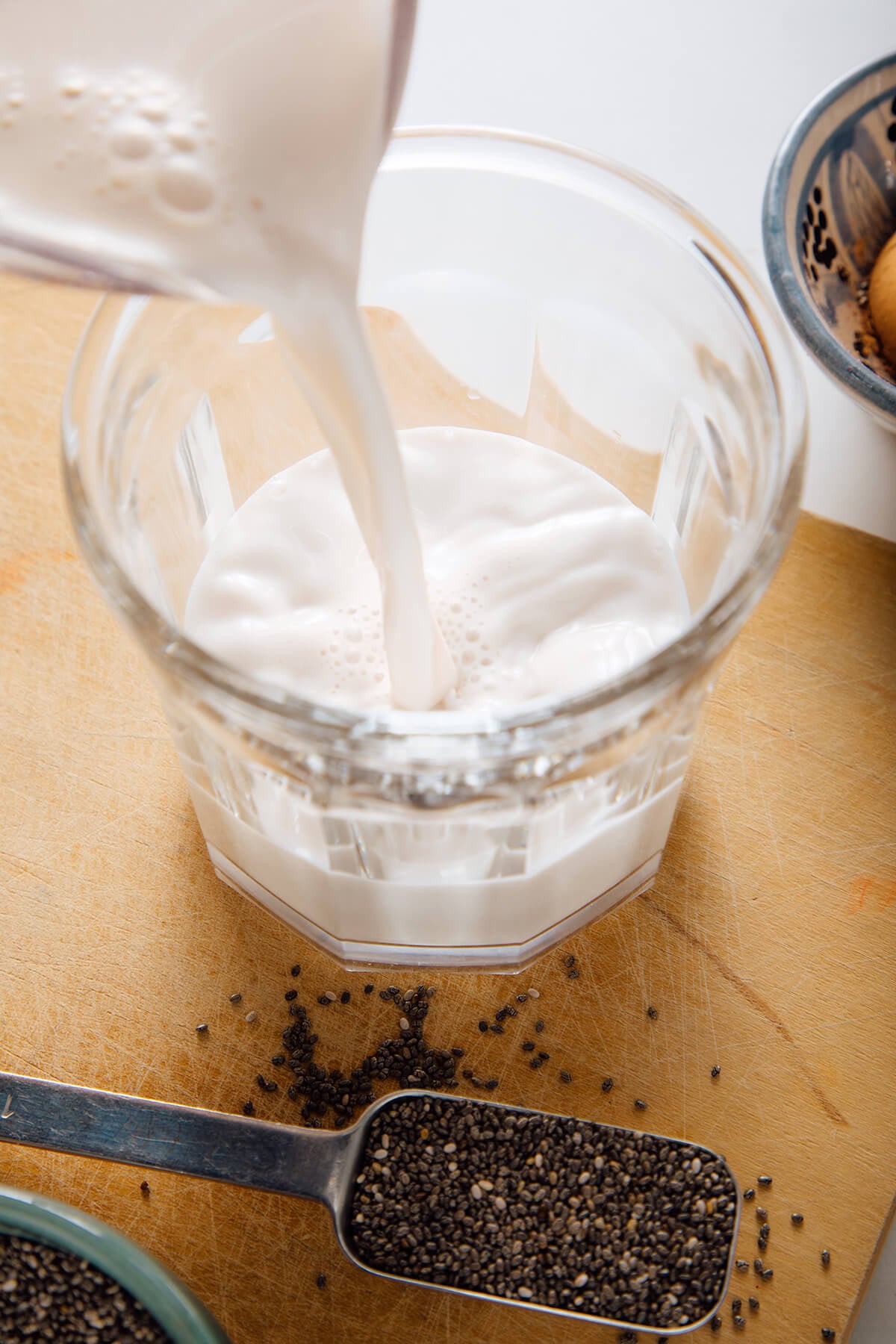pouring milk into jar